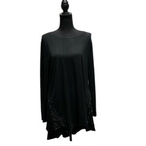 Black tunic size Medium brand LOGO. Black burnout velvet design. Longer in back.